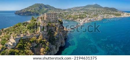 Aerial view on Aragonese castle. The castle is the most impressive historical monument in Ischia, build in 474 BC. Aerial view of the island and town of Ischia.