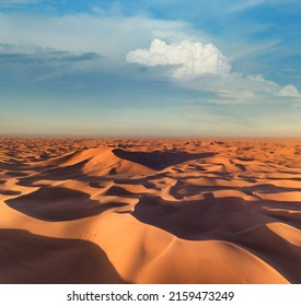 Aerial view on big sand dunes, landscape in Sahara desert at sunrise