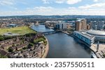 Aerial view on buildings and Lagan River in City center of Belfast Northern Ireland. Drone photo, high angle view of town