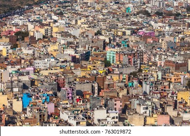 Aerial View On Chaos Of Colored Buildings - The Heap Of Houses In The Asian Cities Caused By Big Human Overpopulation.