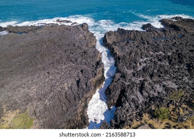 Aerial View On The Chasm At Etang-Salé In The South Of Reunion Island, With A Turquoise Sea And Its Corals