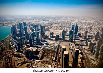 Aerial view on Doha - capital of  Qatar.  Contemporary towers on Doha Corniche in November 2011. - Shutterstock ID 97301399