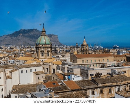 Aerial view on duomo of Gesù Church in Casa professa against hills and the old roofs of Palermo town, Italy, Sicily