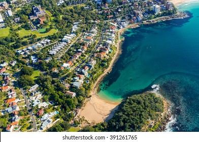 Aerial view on famous Shelly beach and Cabbage Tree bay, Manly. View on Sydney harbourside suburb from above. Aerial view on Sydney neighbourhood, Manly and Cabbage Tree Bay