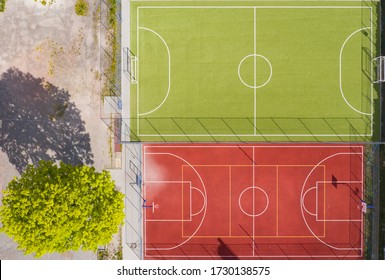 Aerial View On Football Field And Basketball Court In School Yard  From Drone