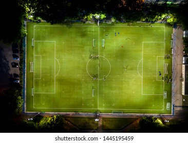 Aerial View On Football Stadium Illuminated By Jupiter On Evening.