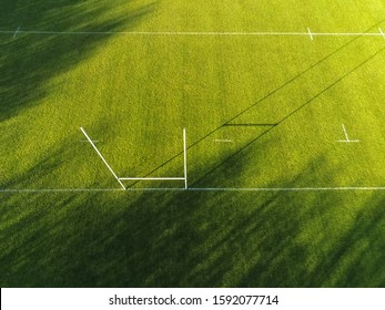 Aerial View On A Goal Posts To Practice Soccer, Football, Rugby And Irish National Sports Hurling And Comogie. Empty Field, Sunny Day.