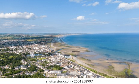 Aerial view on houses on coast of see in Newcastle, Northern Ireland. Coastal town, Drone photo - Powered by Shutterstock