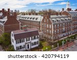 Aerial view on John F Kennedy Street in the Harvard University Area in Cambridge, Massachusetts, the USA. Eliot House white belltower seen on the background.
