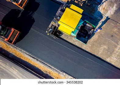 Aerial View On The New Asphalt Road Under Construction