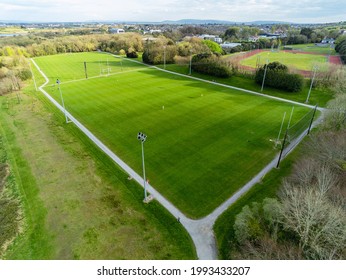 Aerial view on a park with Irish sport training ground for camogie, hurling, rugby, gaelic football, soccer. Tall goal posts. Galway city
