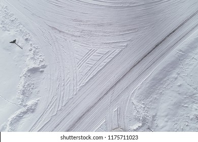 Aerial view on road in winter time, road surrounded with forest trees, car driving in winter time. Rural winter area - Powered by Shutterstock