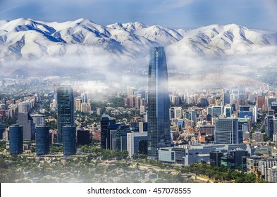 Aerial view on skyscrapers of Financial District of Santiago, capital of Chile under early morning fog - Powered by Shutterstock