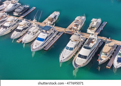 Aerial View On Yachts. White Boats Are Parked In Yacht Club