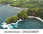 An aerial view of the Onomea Arch and Onomea Bay in Hawaii
