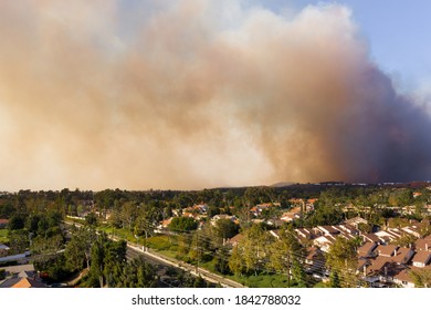 Aerial View Of Orange County California Wildfire Smoke Covering Middleclass Neighborhoods During The Silverado Fire_02