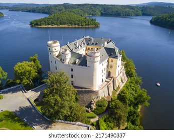 Aerial view of Orlik castle over Orlik reservoir. Beautiful gothic landmark over the lake. Orlik nad Vltavou, South Bohemia, Czech republic. - Shutterstock ID 2171490337