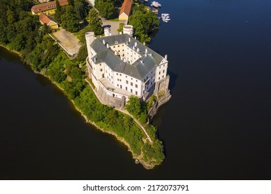Aerial view of Orlik castle over Orlik reservoir. Beautiful gothic landmark over the lake. Orlik nad Vltavou, South Bohemia, Czech republic. - Shutterstock ID 2172073791