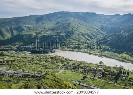 Aerial view from Orthodox Jvari Monastery on Jvari Mount near Mtskheta town, with Zahesi Hydro Power Plant II, Georgia