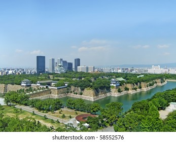 An aerial view of Osaka castle, castle park and surrounding Osaka
