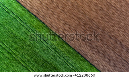 Aerial view over the agricultural fields

