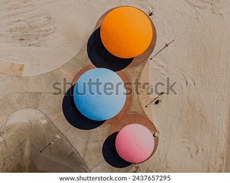 An aerial view over a beach club's colorfully painted buildings with domed roofs. Taken on a sunny day on Long Island New York. Foto stock © 
