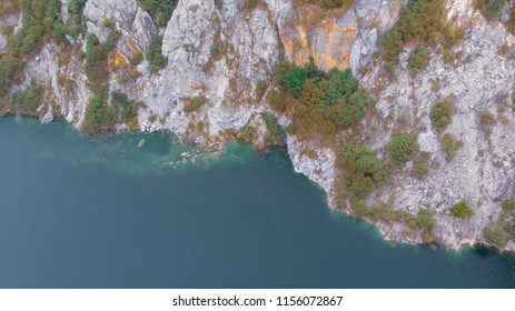 Aerial view over canyon with beautiful blue water.