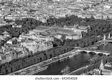 Aerial View Over The City Of Paris And Louvre Museum From Eiffel Tower