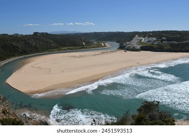 aerial view over empty Odeceixe Beach at the border of the Algarve and Alentejo in Portugal