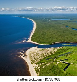 Aerial View Over The Gauja River Outfall, Coastline And Blue Sea