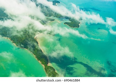 Aerial view over group of island in Andaman sea near Phuket island, southern part of Thailand, Top view from airplane