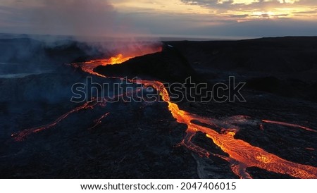 Aerial view over lava eruption, Mount Fagradalsfjall active, iceland
4K drone shot of lava spill out of the crater  Mount Fagradalsfjall, September 2021, Iceland 
