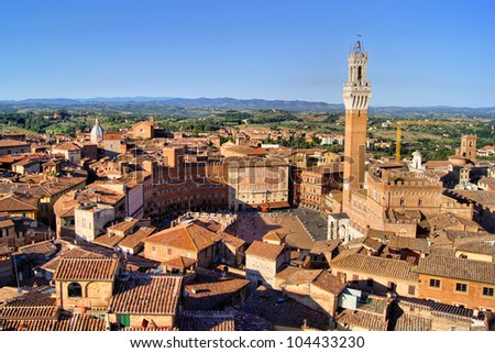 Aerial view over the medieval city of Siena, Italy including Il Campo