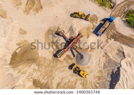 Aerial view over monohydrallite mine field. Sand mine. View from above