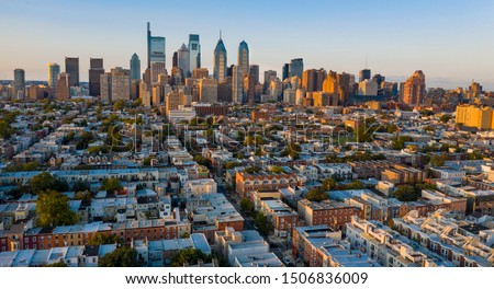 Aerial view over the neighborhoods and streets of Philadelphia PA USA