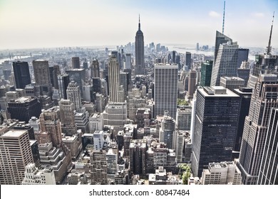 An Aerial View Over New York City, With The Empire State Building In Front. Amazing Overlook At This Big City.