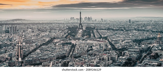 Aerial View Over Paris At Sunset With Iconic Eiffel Tower