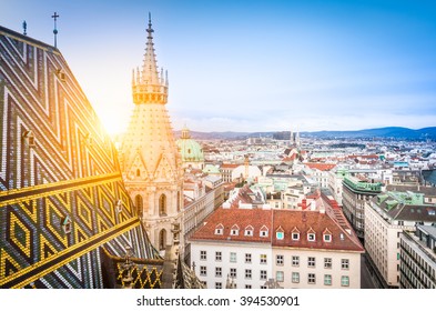 Aerial view over the rooftops of Vienna from the north tower of St. Stephen's Cathedral including the cathedral's famous ornately patterned, multi colored roof created by 230,000 glazed tiles, Austria