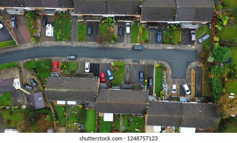 Aerial View Over Suburban Homes And Roads In The UK