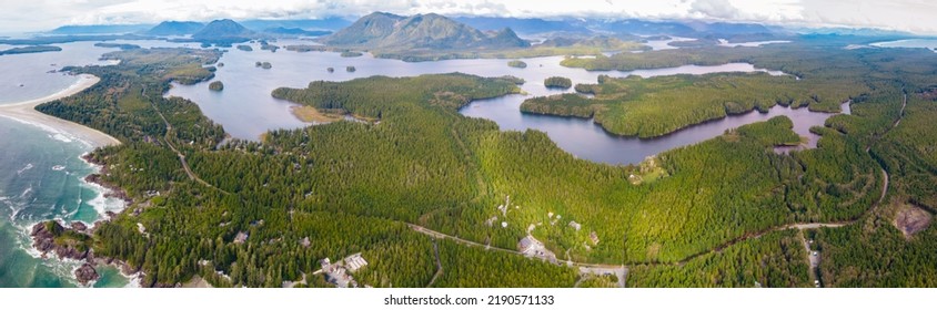 Aerial view over Tofino Pacific Rim national park with a drone from above Cox Bay Vancouver Island Canada. Sunset at long beach Tofino Vancouver Island