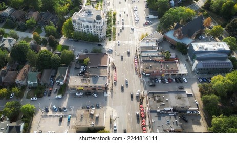 Aerial view overhead of Bloor Street West in western Toronto, Ontario, Canada looking west during late summer afternoon. - Shutterstock ID 2244816111