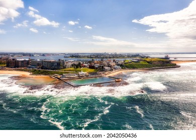 Aerial View From Pacific Ocean Towards Newcastle City Waterfront Around Rock Pools And Beaches At Delta Of Hunter River.