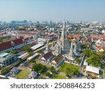 Aerial view pagoda of Wat Arun Buddhist temple sunny day sightseeing city background  travel in bangkok Thailand.