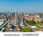 Aerial view pagoda of Wat Arun Buddhist temple sunny day sightseeing city background  travel in bangkok Thailand.