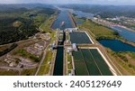 Aerial view Panama Canal, third set of locks, water shortages, maritime traffic, water reuse vats, summer drought.