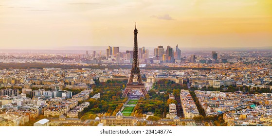 Aerial view of Paris with the Eiffel tower at sunset