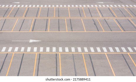 Aerial View Of A Parking Lot Of A Large Italian Shopping Center. There Are No People Or Cars Parked.