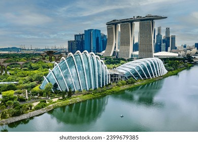 Aerial view of the parks, gardens and modern buildings at the Marina Bay area of the city of Singapore - Powered by Shutterstock