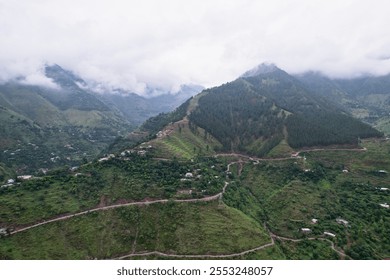 Aerial View of Patikka town in Muzaffarabad Azad Kashmir -  Surrounded with lush valleys, winding rivers, and mountain scenery. Azad Kashmir, Pakistan - Powered by Shutterstock