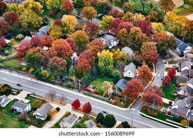 Aerial View Of A Peaceful Midwest Town In Autumn, Taken From An Airplane.